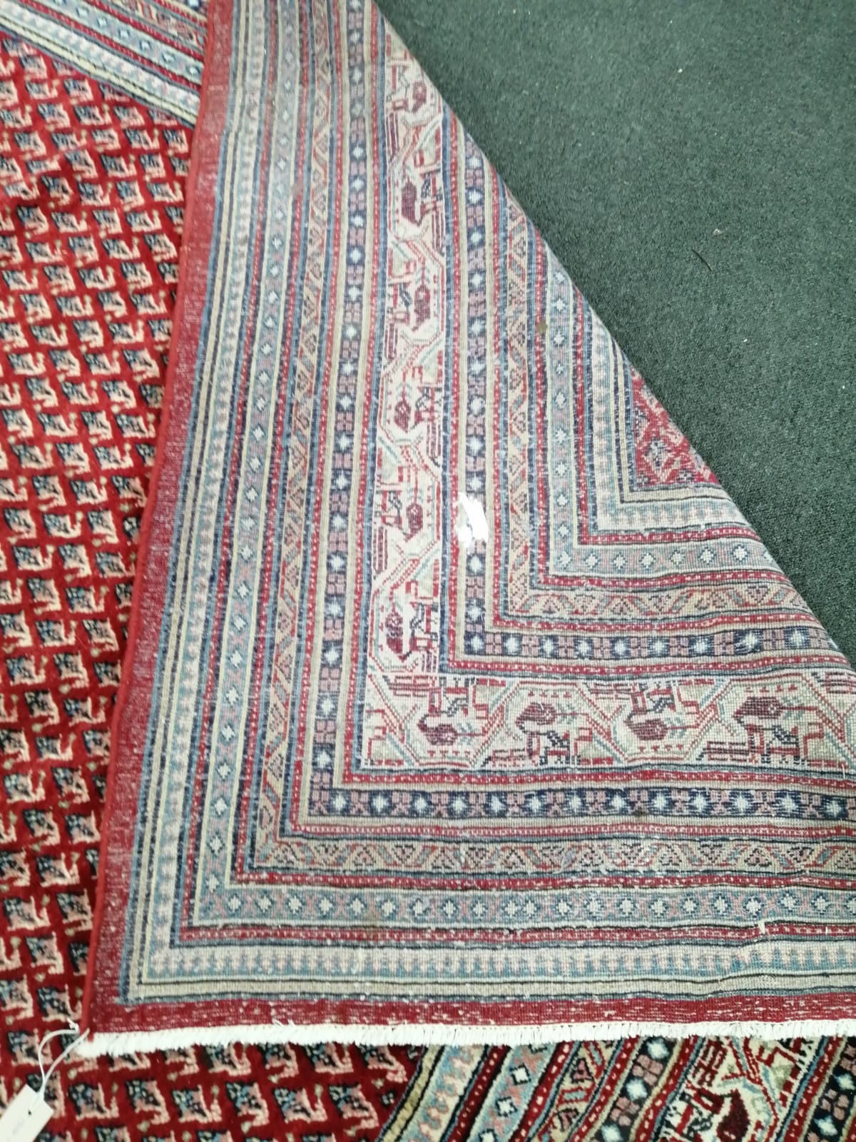 A North West Persian red ground carpet, 366 x 272cm